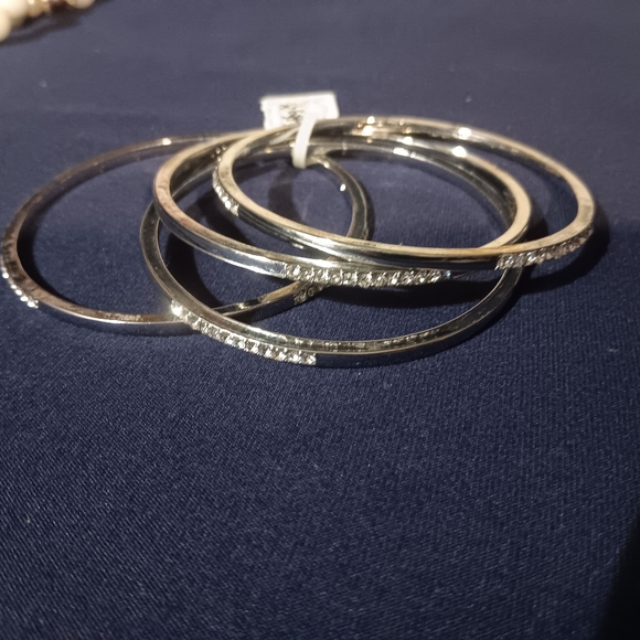 Macy's Silver toned Rhinestone Bangles - Picture 2 of 4